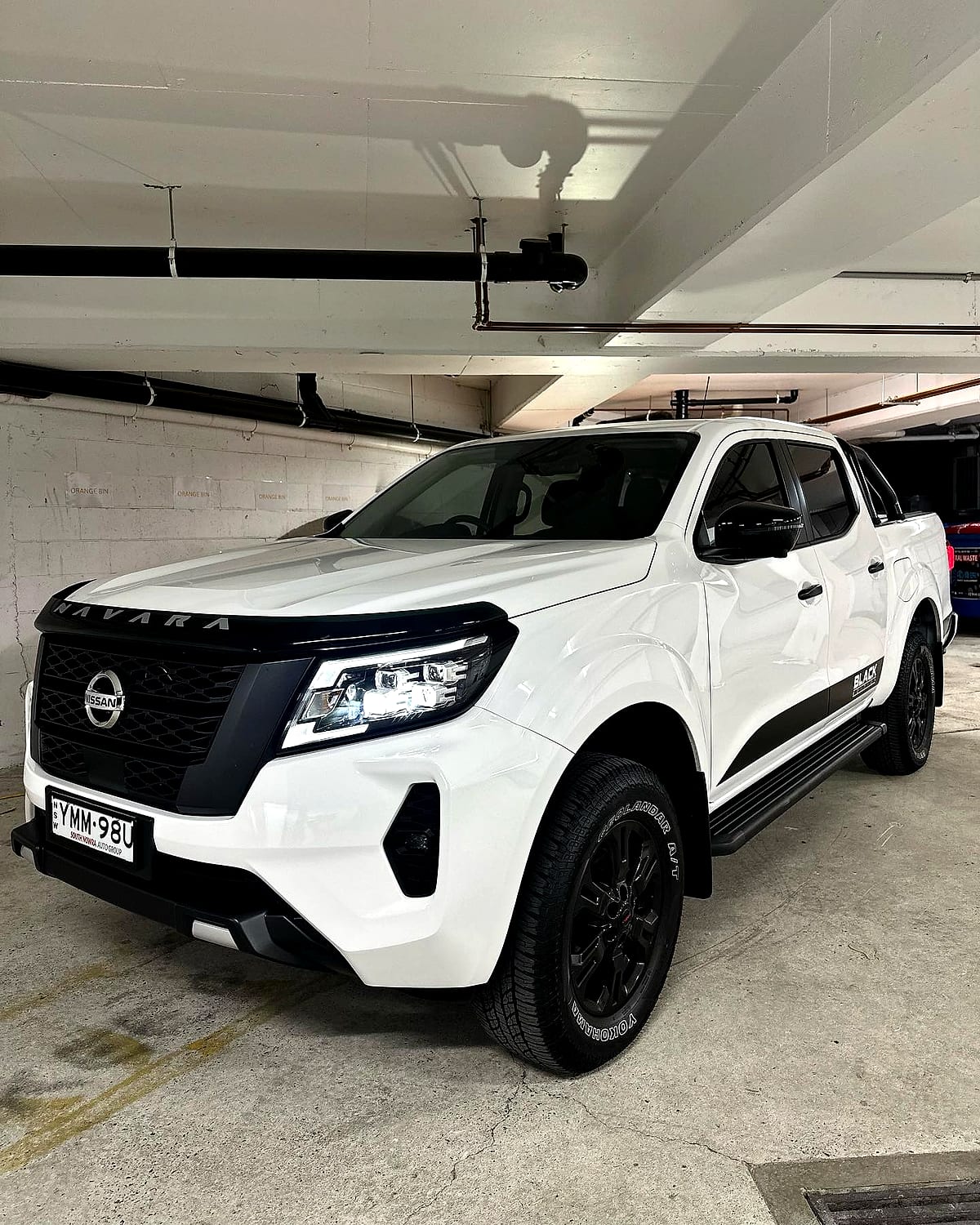 White Nissan Navara Black Edition with ceramic coating and interior protection